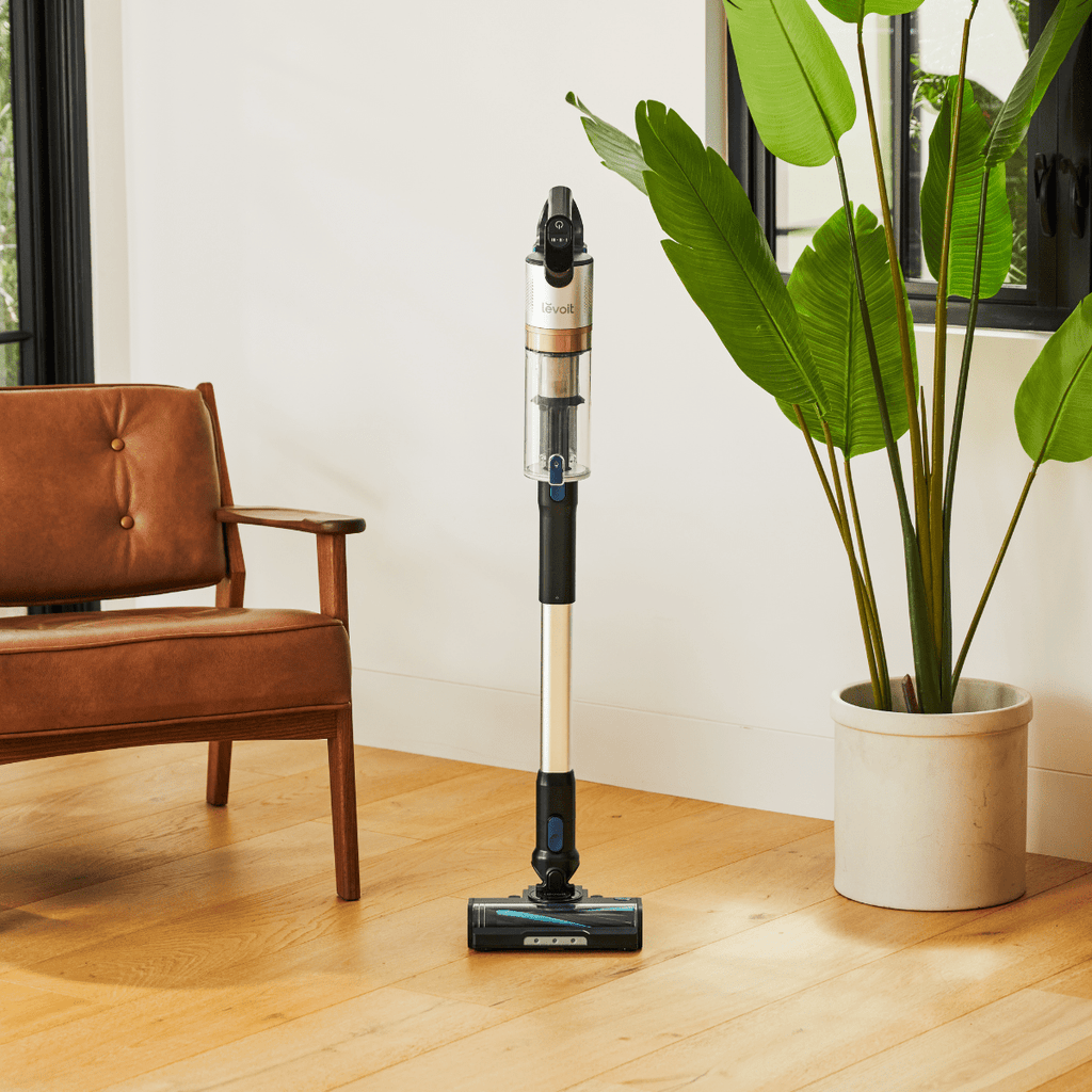 Levoit LVAC-300 Cordless Stick Vacuum self-standing on hardwood floor. Lightweight home vacuum.