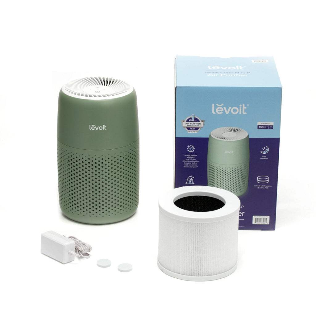 Levoit Core® Mini Air Purifier (Green) with its box and filter