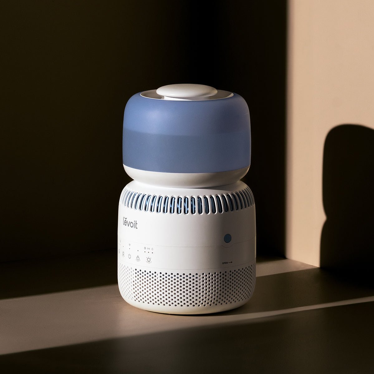 Levoit Sprout Evaporative Humidifier with smart features and customizable night light, placed in a warm setting