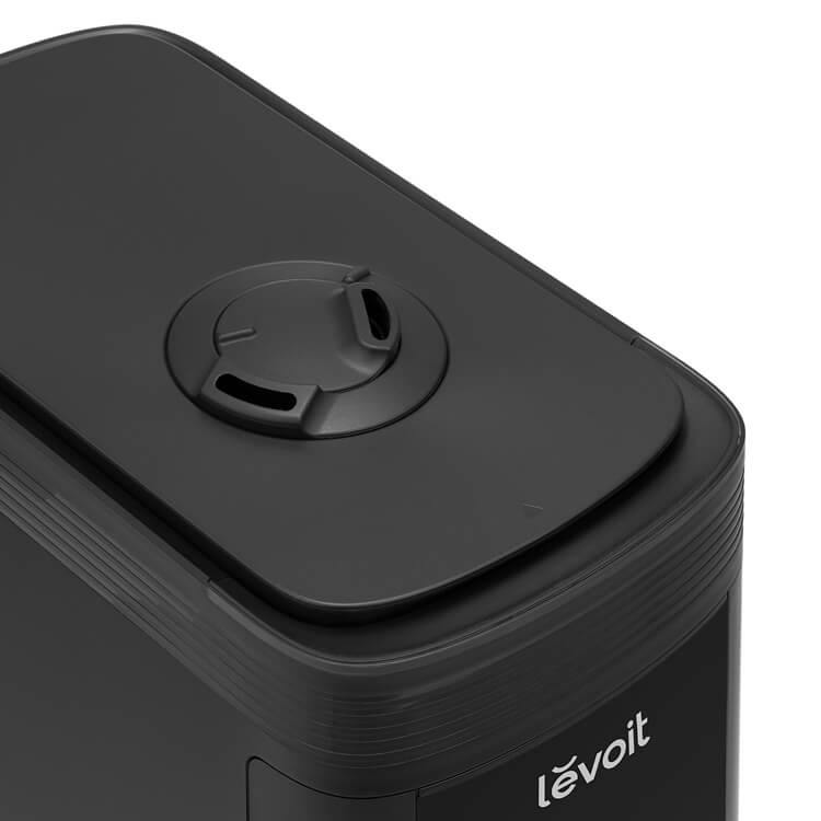 Close-up of the top cap of the Levoit Smart Humidifier, designed for easy and secure water refilling.