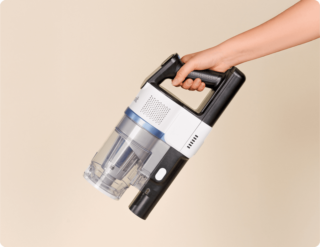 Hand holding the lightweight Levoit AERO™ cordless vacuum main unit for handheld cleaning.