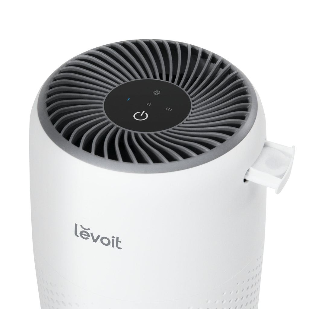 Levoit Core® Mini-P Air Purifier top view with control panel, showing sleek design and easy-to-use interface. Ideal for small spaces.