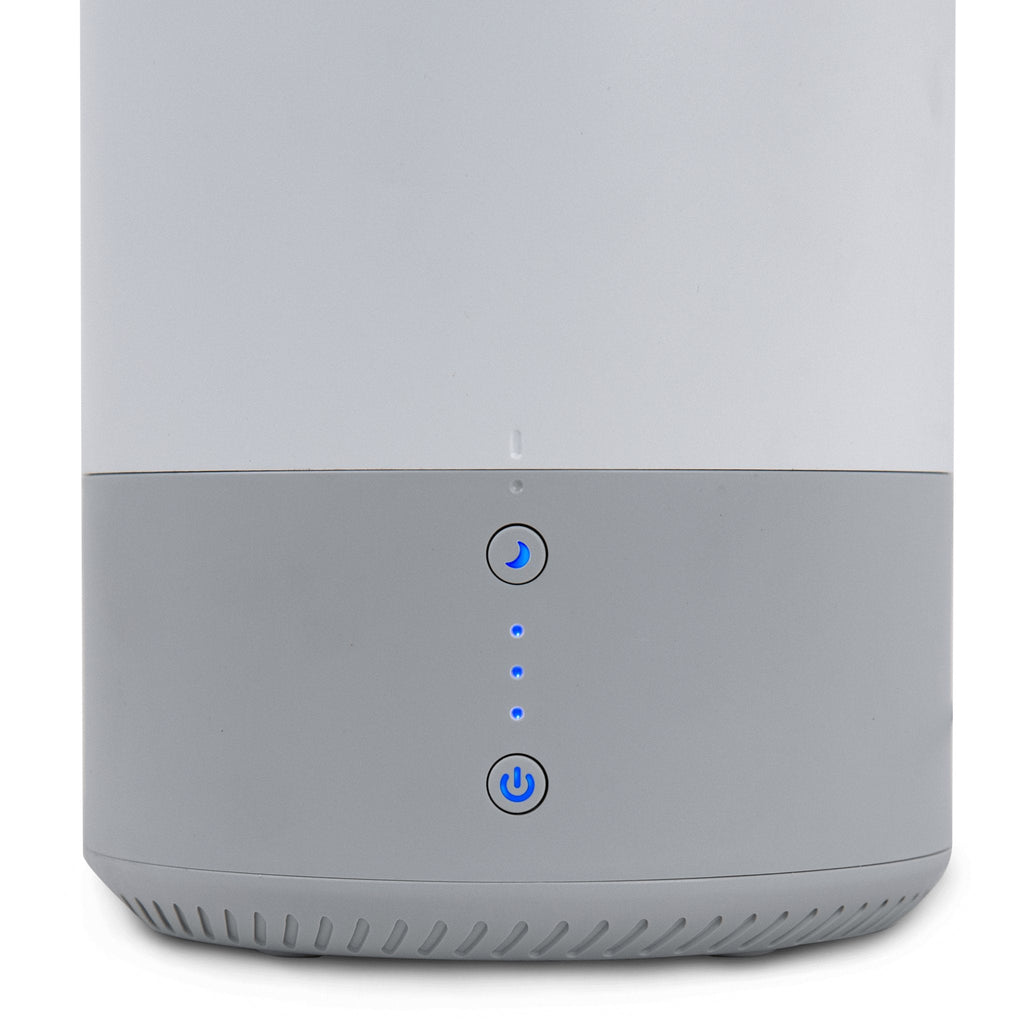 Close-up of Levoit Dual 100 Ultrasonic Humidifier & Diffuser controls, showing power and mist level buttons with blue LED indicators.